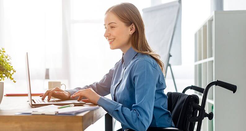 WCAG - positive-adult-woman-working-office-1